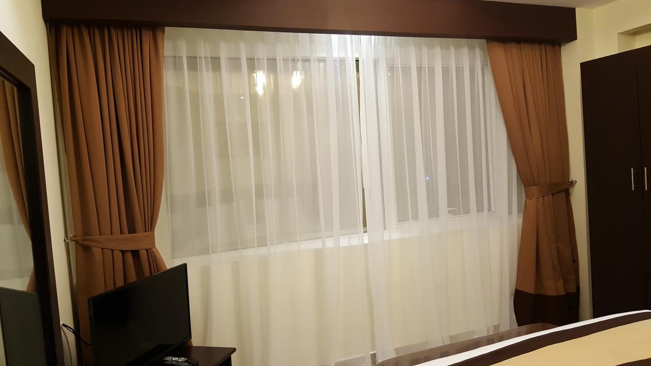 Travellers Hotel Apartment Дубай Екстериор снимка